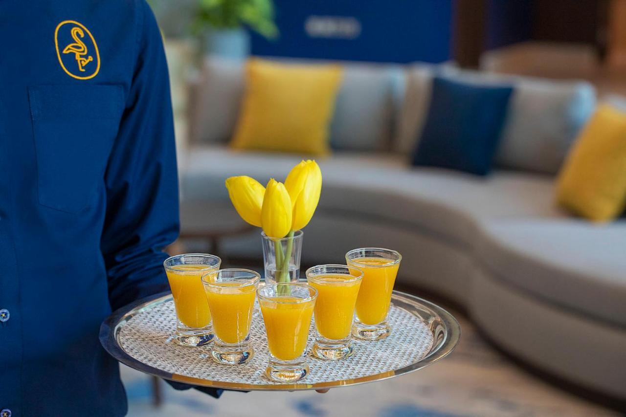 Отель Voco Al Khobar By Ihg Экстерьер фото A tray of orange juice